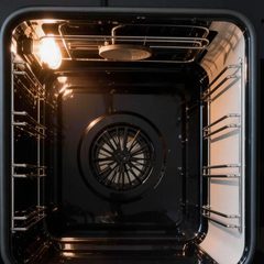 Example: same oven back wall after cleaning. Illustration.